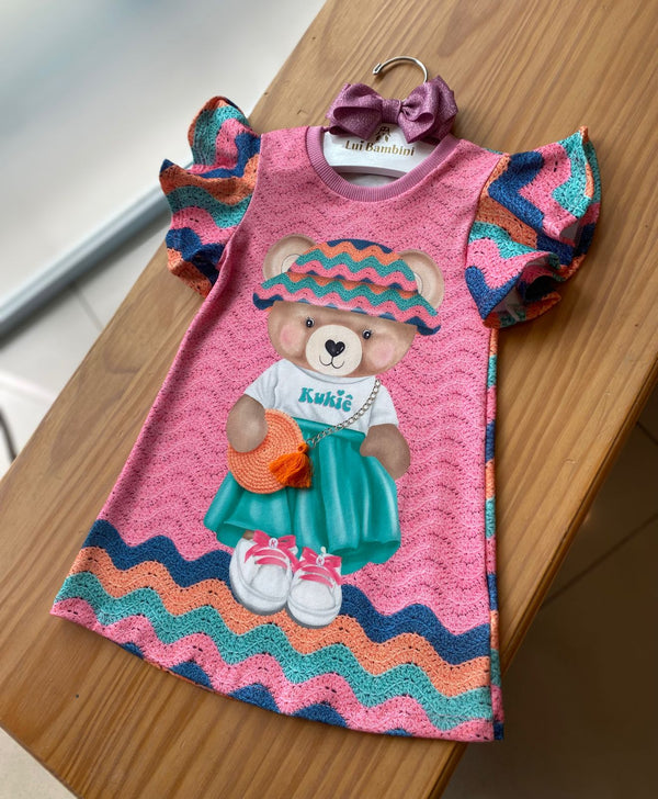 Roupa para boneca Barbie em crochê - vestido roxo com mangas bufantes.